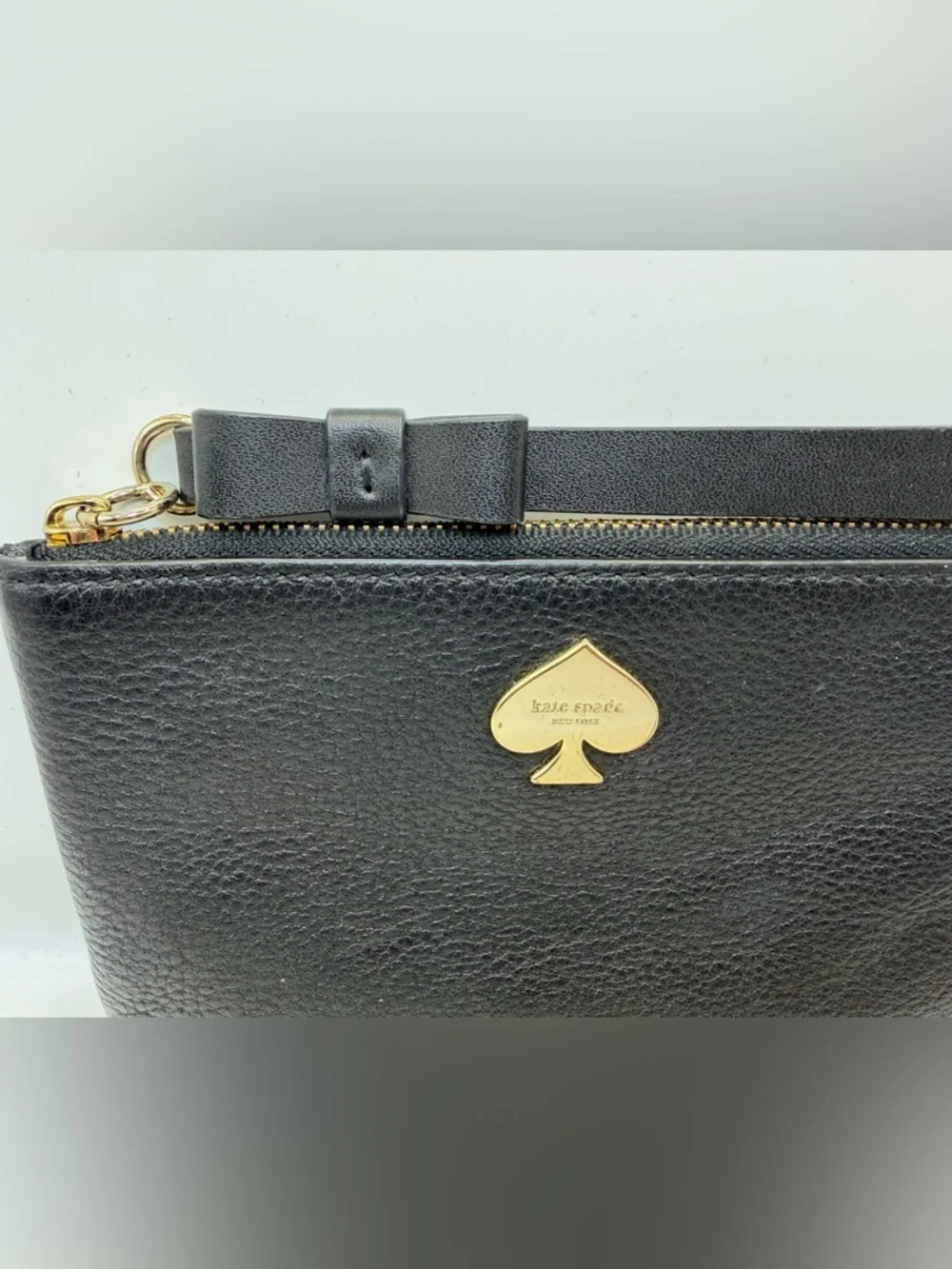 Kate Spade Black Leather Wristlet Bow Strap Gold Spade Logo  GUC